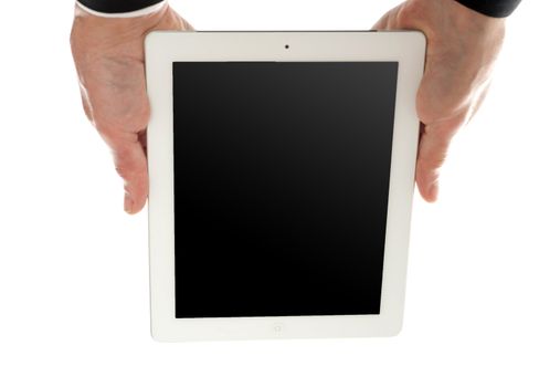 Man holding tablet device upside down isolated over white background