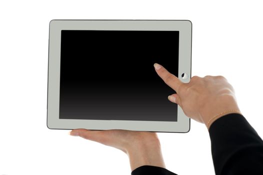 Female finger pointing at blank screen of tablet pc. All on white background