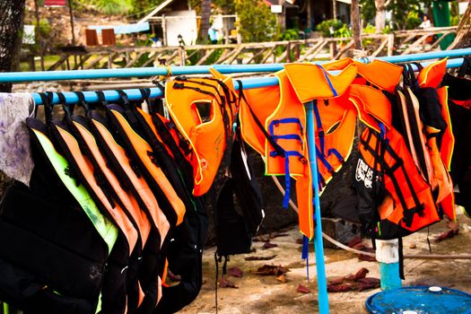 Many life jackets.  Were hung in the rack.