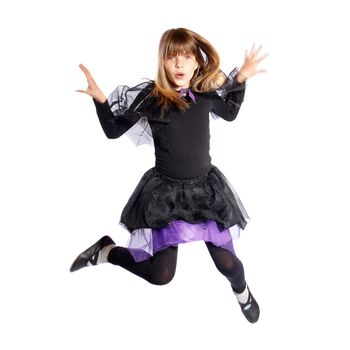 jumping girl in bat costume on white background