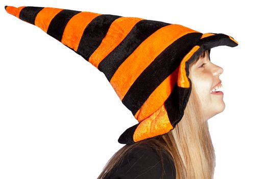 Laughing girl with big witches hat