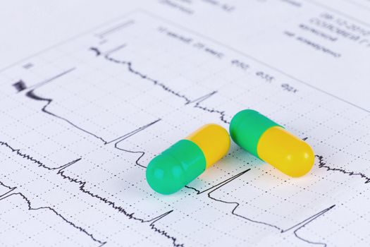 Macro of pills lying on ECG diagram