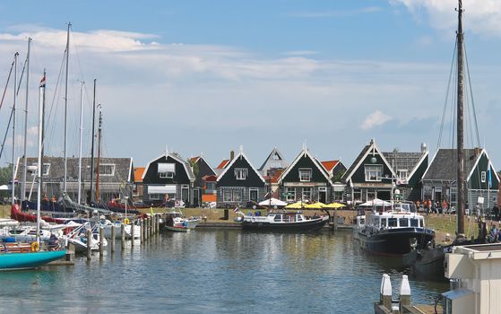 Tourists on the island of Marken pier. Netherlands