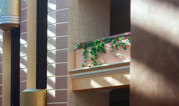 Narrow photo of balcony  in a hotel.