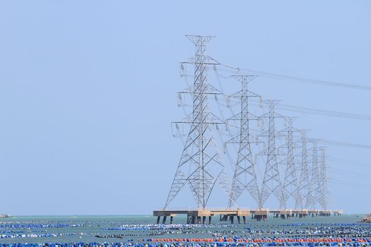 High voltage power pole in the sea