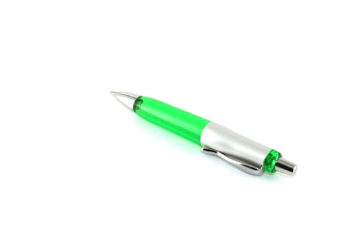 Green ball-point pen over white