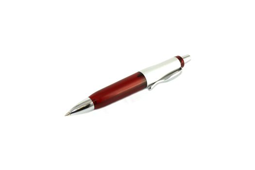 Brown ball-point pen over white