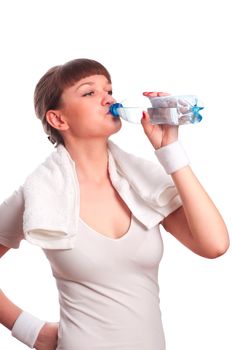 woman drinks water from a bottle isolated on white background