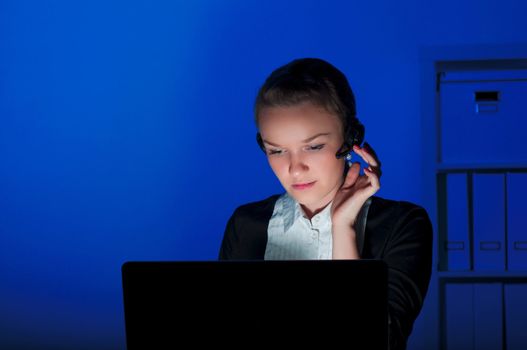 portrait of a woman in the night office