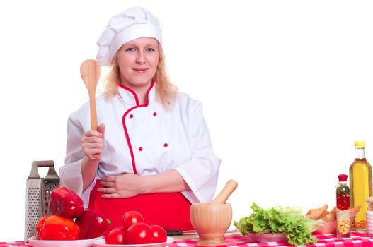 female chef holding a spatula for cooking