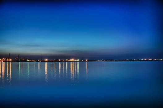 Night coastline, view from the pier of Odessa Sea Port. Ukraine.