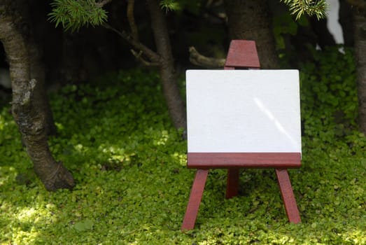 blank easel in the countryside