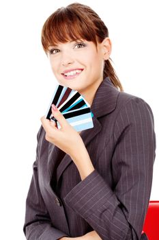 Happy woman with credit cards, isolated on white background