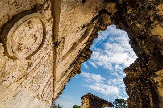 Looking through a hole in the roof of the main palace at the ancient Mayan ruins of Palenque in Chiapas, Mexico