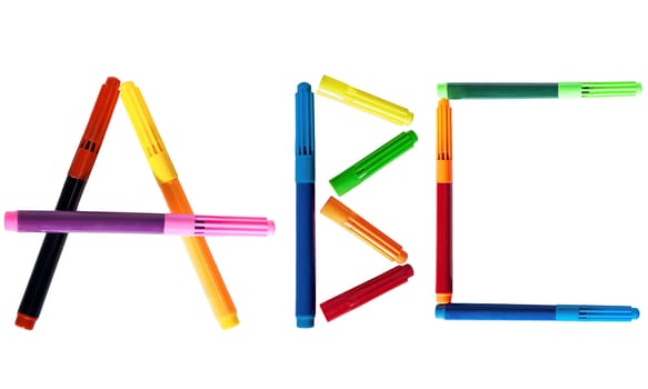 Colored markers posted ABC letter on a white background.