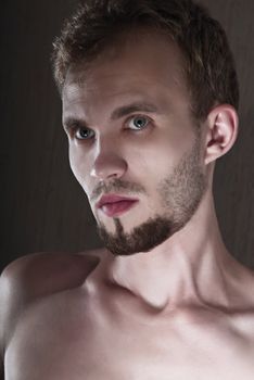 Portrait of a young man in a lower key.