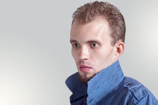 Elegant young handsome man Studio fashion portrait