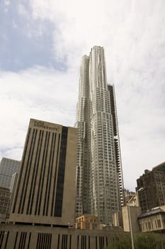 NEW YORK CITY - MAY 24, 2011: Frank Gehry's Beekman Tower contains luxury apartments and stands as the 8th tallest building in the city.