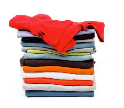 Red T-Shirt and Stack of Color Clothes isolated on white background