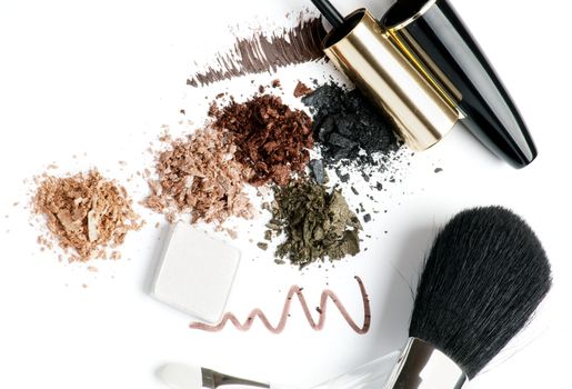 Make up Brushes, Eyeliner, Mineral Eyeshadow and Mascara isolated on white background