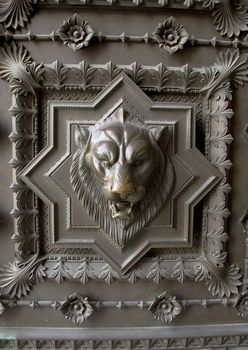 Lion head engraving on the door of Notre Dame de Fourviere in Lyon, France.