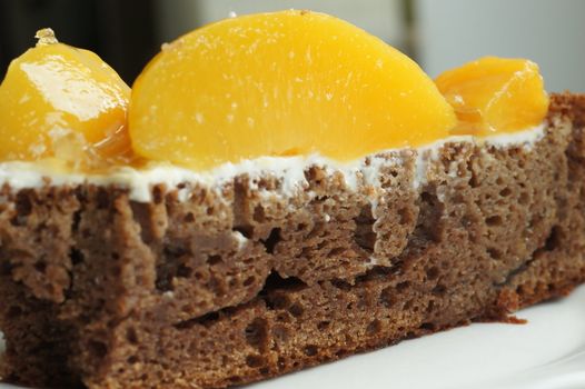 the chocolate biscuit with a peach close up