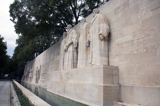 The four reformists commemorated on a wall in Parc Des Bastions in Geneva, Switzerland.  Depicted are William Farel, John Calvin, Theodore de Beze and John Knox.  These statues are more than 15 feet high each.