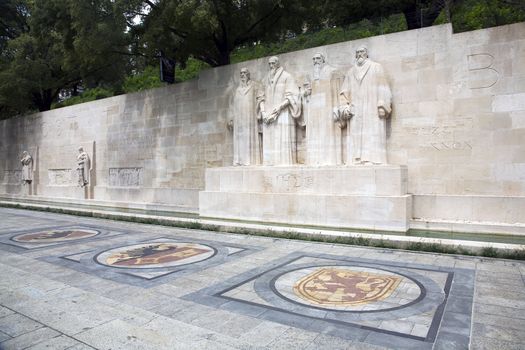 The four reformists commemorated on a wall in Parc Des Bastions in Geneva, Switzerland.  Depicted are William Farel, John Calvin, Theodore de Beze and John Knox.  These statues are more than 15 feet high each.