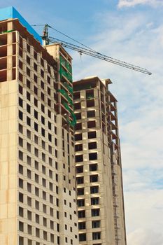 Under construction building with blue sky