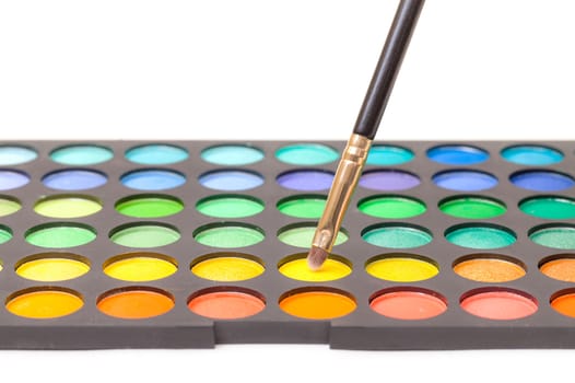 Set of Multicolored Eyeshadows with Brush, closeup