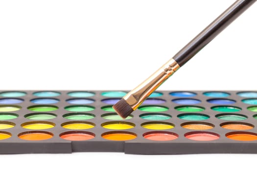 Set of Multicolored Eyeshadows with Brush, closeup