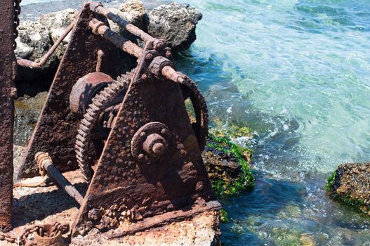 Old winch at a harbour on Crete Island, Greece