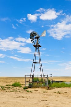 Windmill water pump to supply livestock with drinking water.