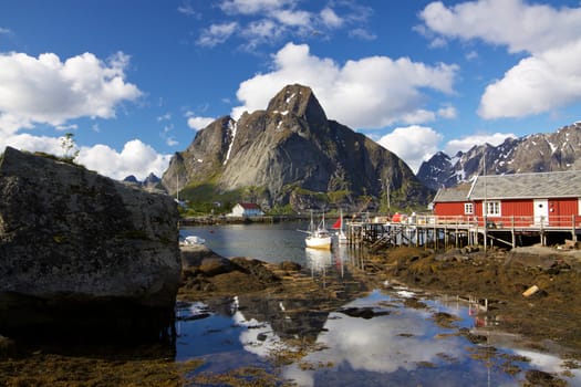 Picturesque fishing town of Reine by the fjord on Lofoten islands in Norway