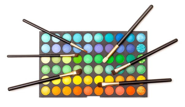 Set of Multicolored Eyeshadows with Brushes, closeup