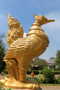 Large golden bird statue