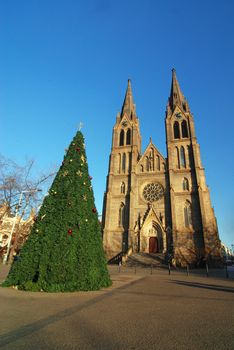 Cathedral of Saint Ludmila in Prague and a christmas tree in front of it