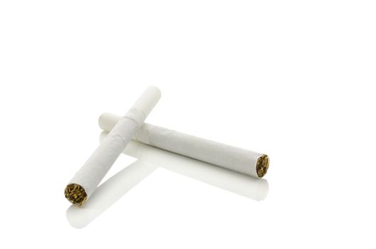 Two cigarettes isolated over white background with reflection.