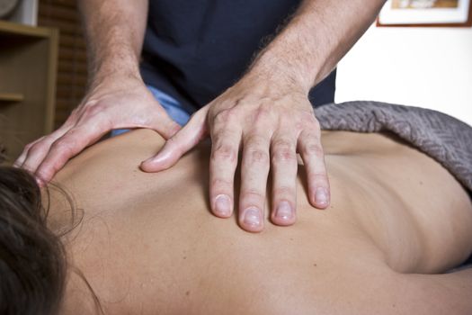 Woman at spa getting a stress-free massage