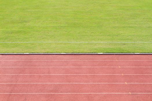 Running track with grass field