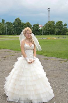 The young beautiful wife in the wedding day