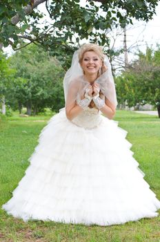 The young beautiful wife in the wedding day