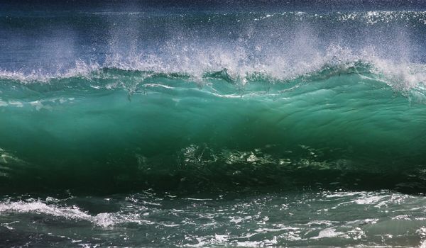 Big wave crashes on to the shore. Indian ocean
