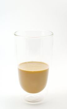 Milk tea half clear glass on white background