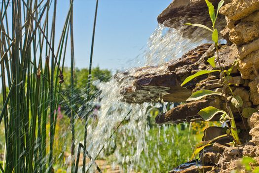 Little cascade in a garden
