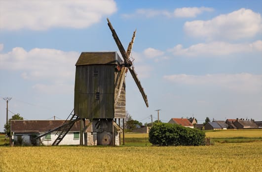 Traditional wooden windmill in France in the Eure &Loir Valley region.This is Saint-Thomas mill.