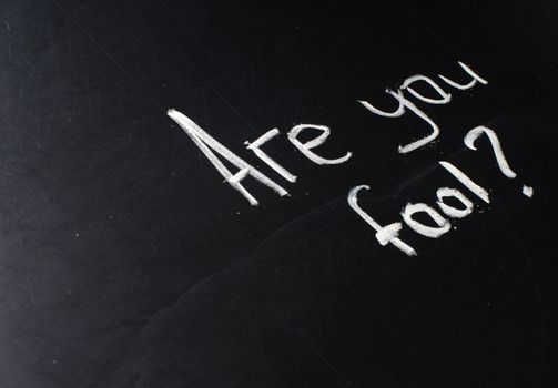 Conceptual phrase written on school board by chalk