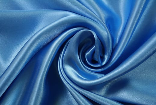 Smooth elegant dark blue silk can use as background 