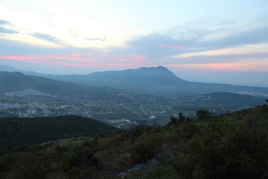 Summer landscape in mountains with the sun