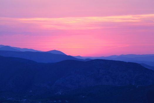 Summer landscape in mountains with the sun